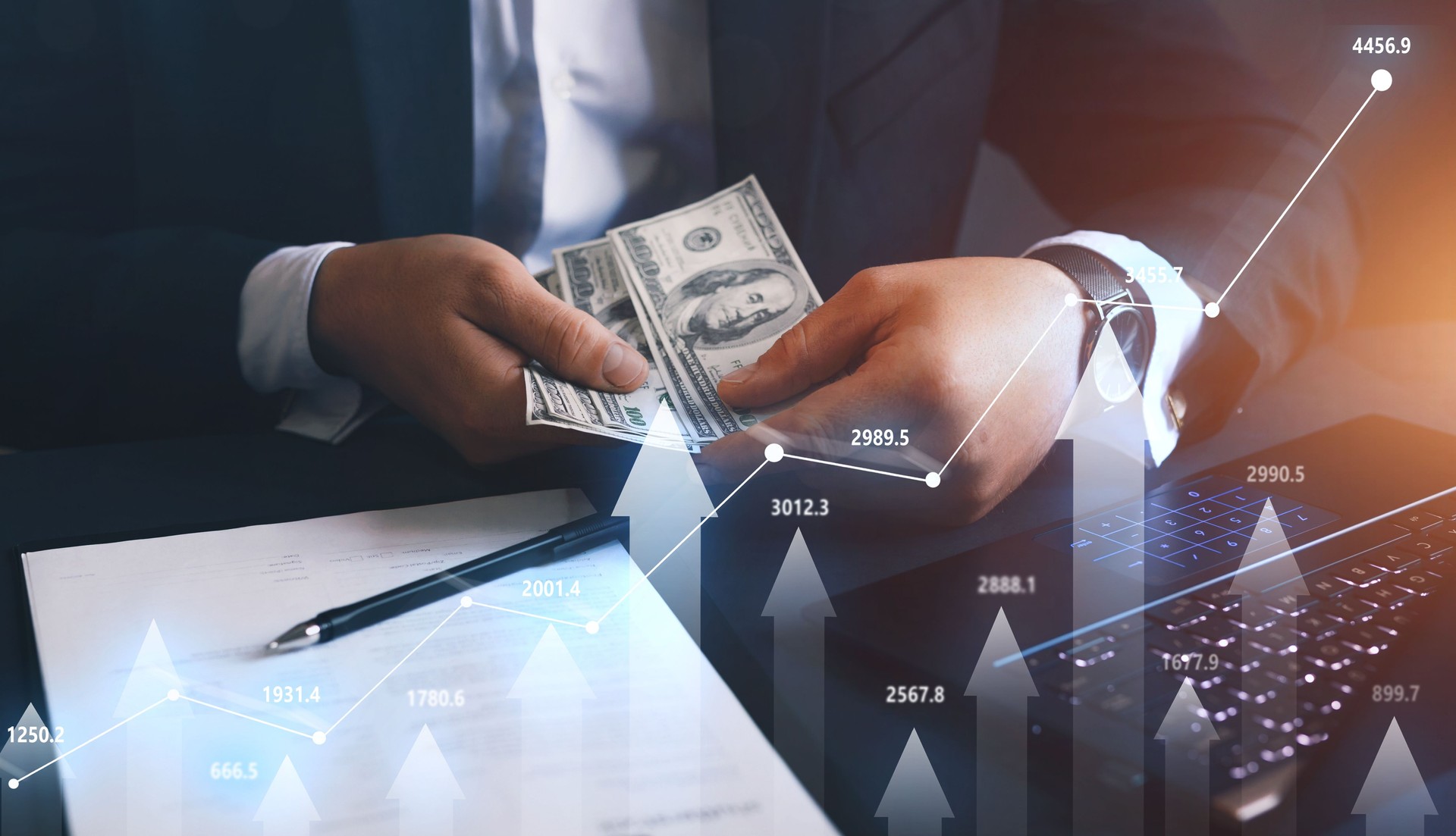 Businessman counting the money earned. Financial stock market graph.Business investment and currency exchange.